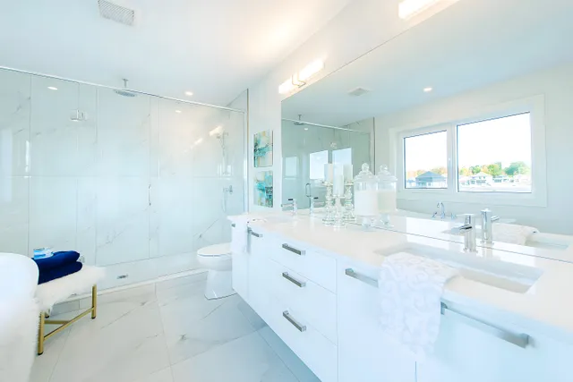 Ensuite vanity on a marble-look porcelain floor